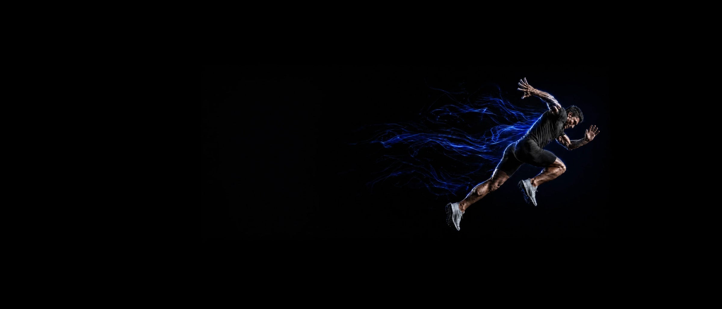 MAXPULSE™ PRO Men collection banner featuring a male athlete sprinting through blue performance energy on a black background for JUST-ORIGINALS training apparel.