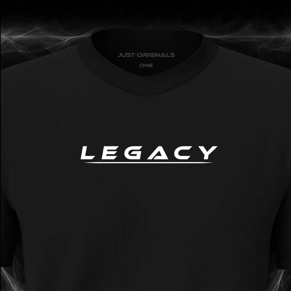 JUST-ORIGINALS™ LIFESTYLE ONE Unisex Tee — LEGACY I design close-up on BlackPulse™ premium fabric featuring clean white typography with a white underline.