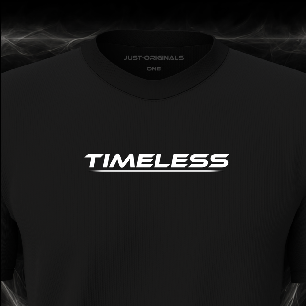 Close-up of the JUST-ORIGINALS™ LIFESTYLE ONE Unisex TIMELESS I design on a BlackPulse™ premium black t-shirt, featuring white TIMELESS typography, white underline, and premium neck label.