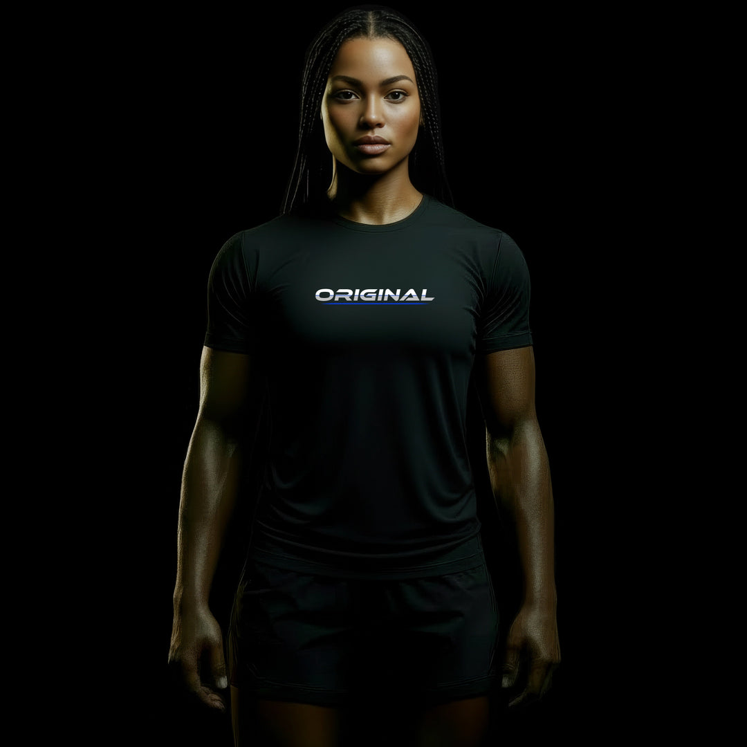 JUST-ORIGINALS™ LIFESTYLE PRIME female model wearing the ORIGINAL II design on BlackPulse™ colorway against a black premium background.