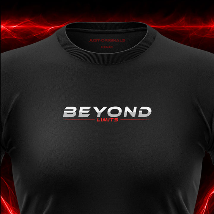 Close-up of the JUST-ORIGINALS™ MAXPULSE CORE Women BEYOND LIMITS design on a BlackPulse™ performance t-shirt, featuring white BEYOND typography, red LIMITS text, red performance accent line, and premium neck label.