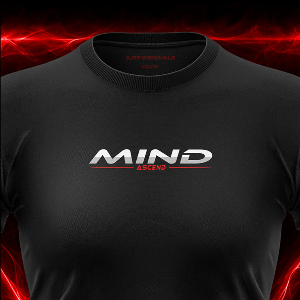 Close-up of the JUST-ORIGINALS™ MAXPULSE™ CORE Women MIND ASCEND design on a BlackPulse™ performance t-shirt, featuring white and silver MIND typography, red ASCEND text, red accent line, red premium neck label, and premium athletic fabric.