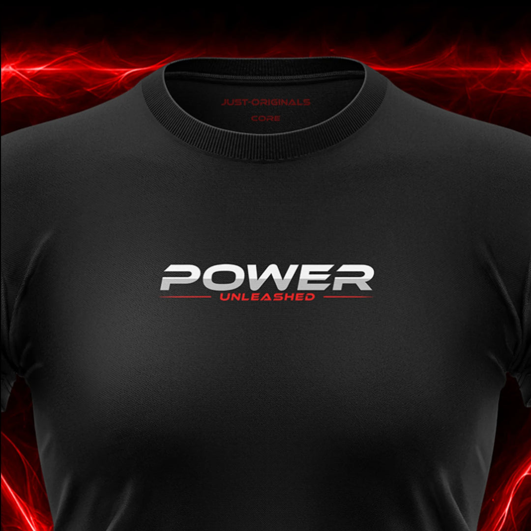 Close-up of the JUST-ORIGINALS™ MAXPULSE™ CORE Women POWER UNLEASHED design on a BlackPulse™ performance t-shirt, featuring white and silver POWER typography, red UNLEASHED text, red accent line, red premium neck label, and premium athletic fabric.