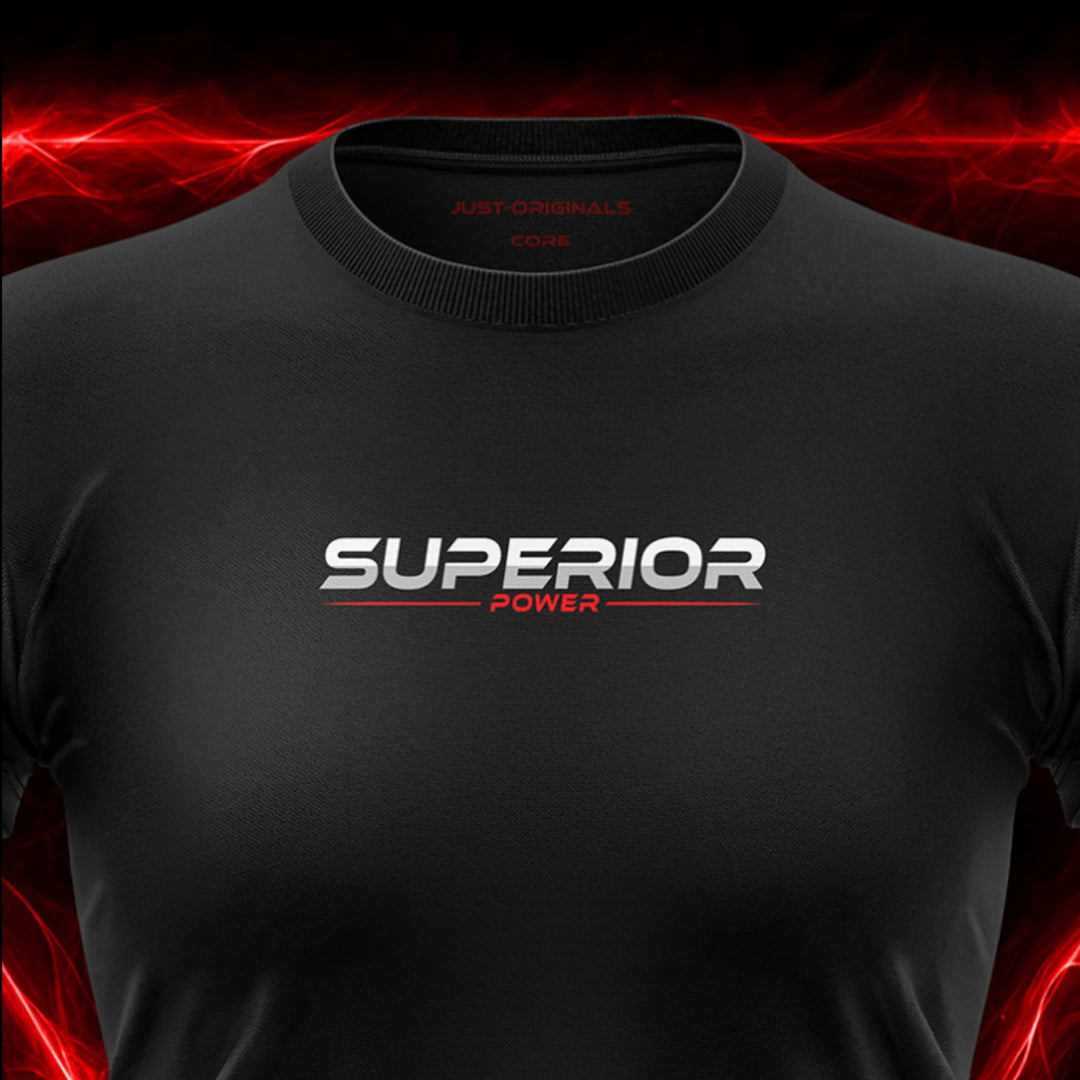 Close-up of the JUST-ORIGINALS™ MAXPULSE™ CORE Women SUPERIOR POWER design on a BlackPulse™ performance t-shirt, featuring white and silver SUPERIOR typography, red POWER text, red accent line, red premium neck label, and premium athletic fabric.