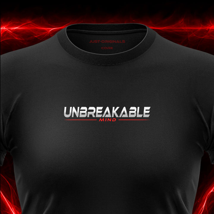 Close-up of the JUST-ORIGINALS™ MAXPULSE™ CORE Women UNBREAKABLE MIND design on a BlackPulse™ performance t-shirt, featuring white and silver UNBREAKABLE typography, red MIND text, red accent line, red premium neck label, and premium athletic fabric.