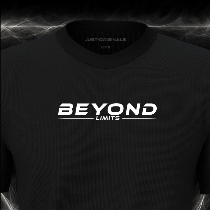 Close-up of the JUST-ORIGINALS™ MAXPULSE™ LITE Men BEYOND LIMITS design on a BlackPulse™ performance t-shirt, featuring white BEYOND LIMITS typography, a white underline, and premium neck label.
