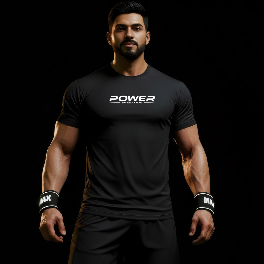 MAXPULSE™ LITE Men | POWER IN MOTION | BlackPulse™ performance tee | Front model view wearing lightweight athletic fit with clean white chest print | Male fitness model front-facing with defined physique in dark studio lighting | Featured in MAXPULSE™ LITE Men Tee