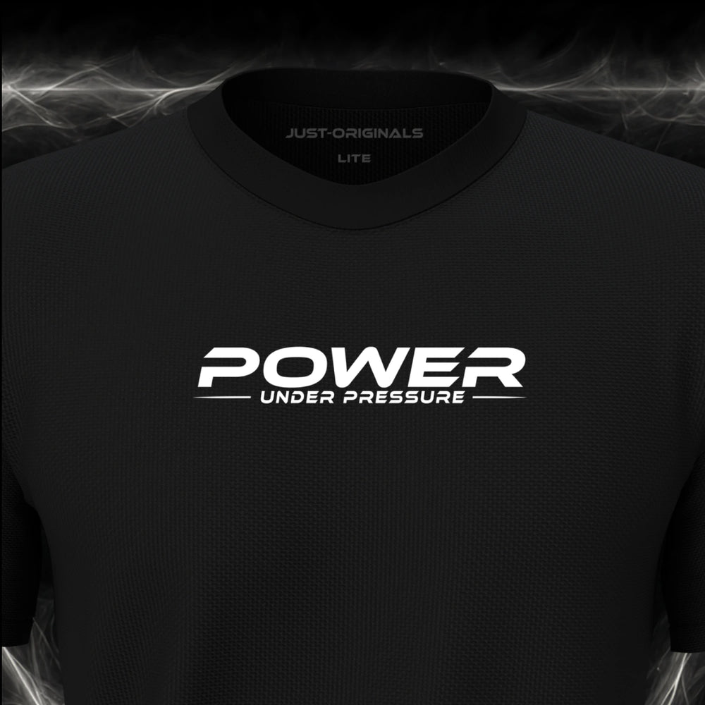 Close-up of the JUST-ORIGINALS™ MAXPULSE™ LITE Men POWER UNDER PRESSURE design on a BlackPulse™ performance t-shirt, featuring white POWER typography, white UNDER PRESSURE text, a white underline, and premium neck label.