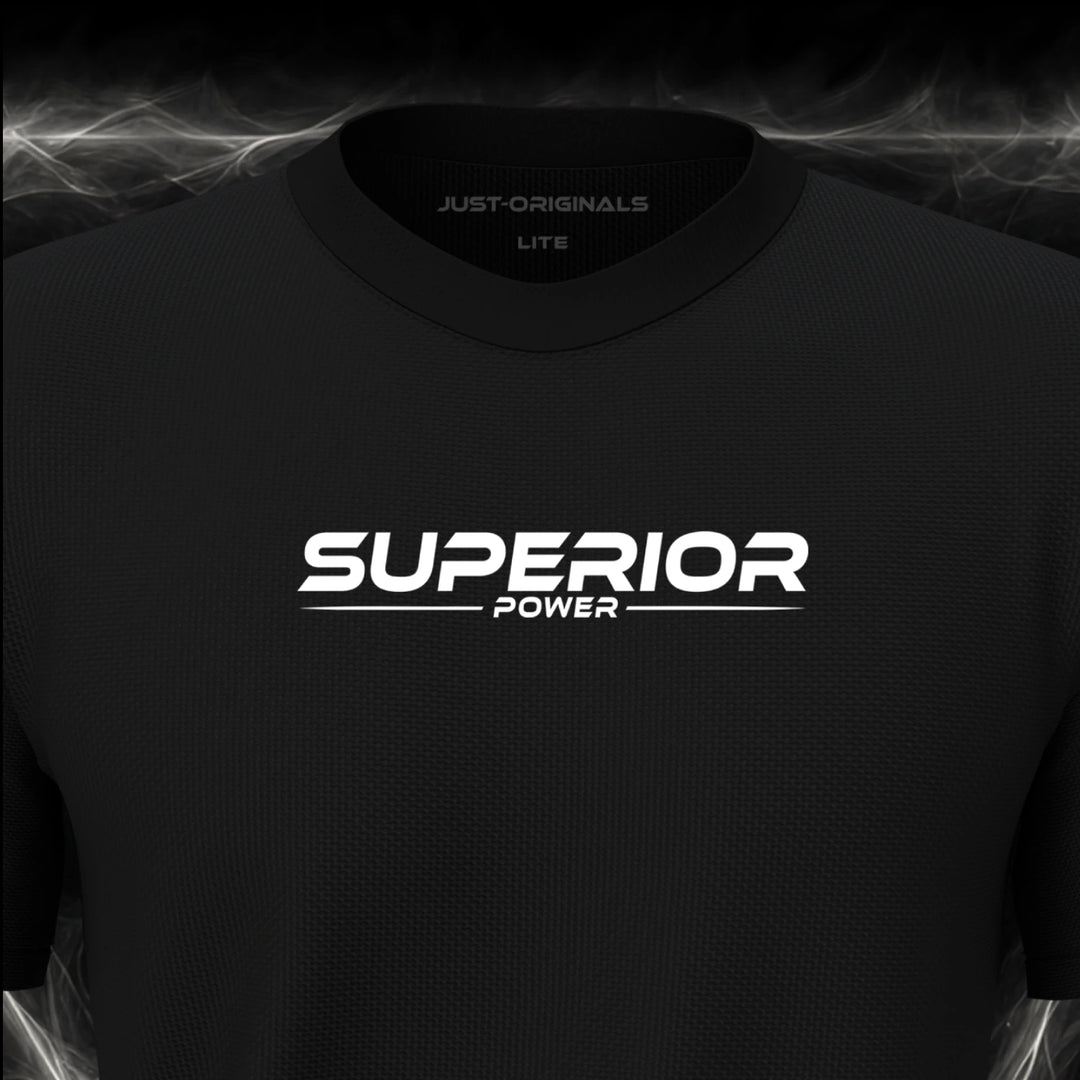 Close-up of the JUST-ORIGINALS™ MAXPULSE™ LITE Men SUPERIOR POWER design on a BlackPulse™ performance t-shirt, featuring white SUPERIOR POWER typography, a white underline, and premium neck label.