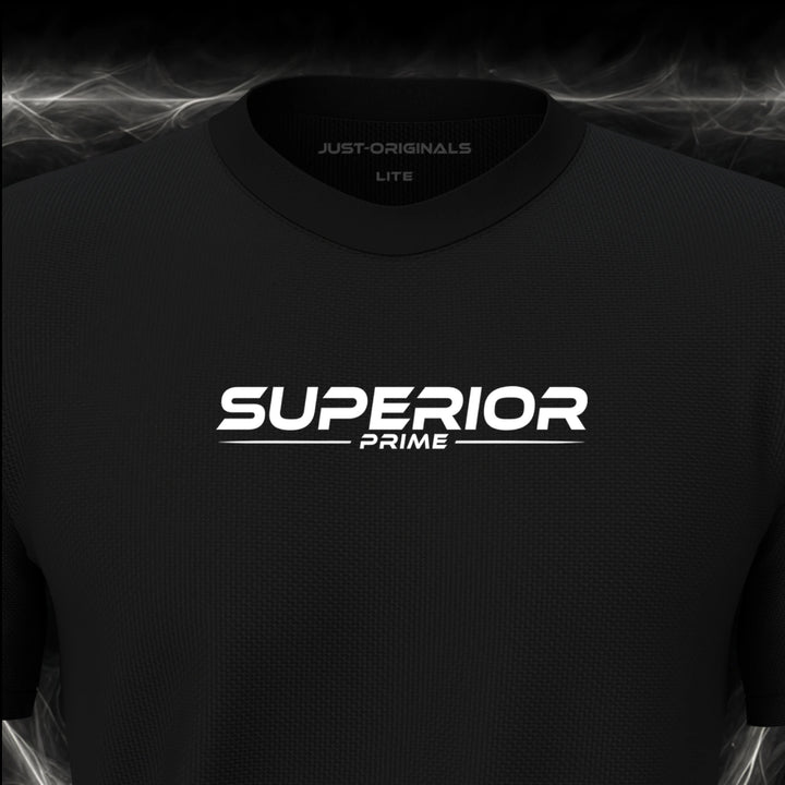 Close-up of the JUST-ORIGINALS™ MAXPULSE™ LITE Men SUPERIOR PRIME design on a BlackPulse™ performance t-shirt, featuring white SUPERIOR PRIME typography, a white underline, and premium neck label.