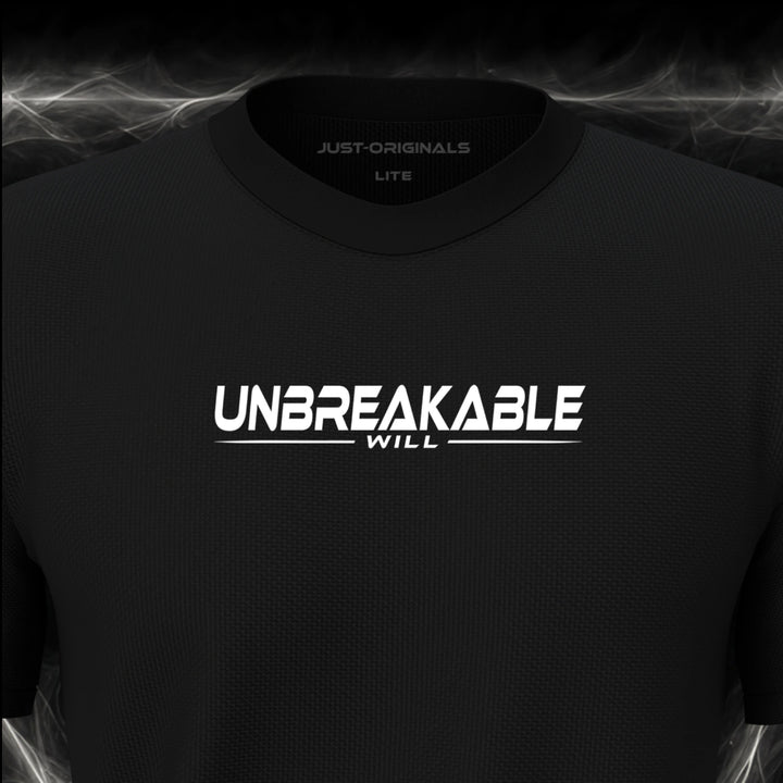 Close-up of the JUST-ORIGINALS™ MAXPULSE™ LITE Men UNBREAKABLE WILL design on a BlackPulse™ performance t-shirt, featuring white UNBREAKABLE typography, white WILL text, a white underline, and premium neck label.