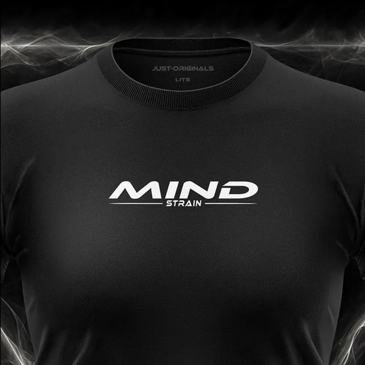 Close-up of the JUST-ORIGINALS™ MAXPULSE™ LITE Women MIND STRAIN design on a BlackPulse™ performance t-shirt, featuring white and silver MIND typography, white STRAIN text, white accent line, silver premium neck label, and premium athletic fabric.