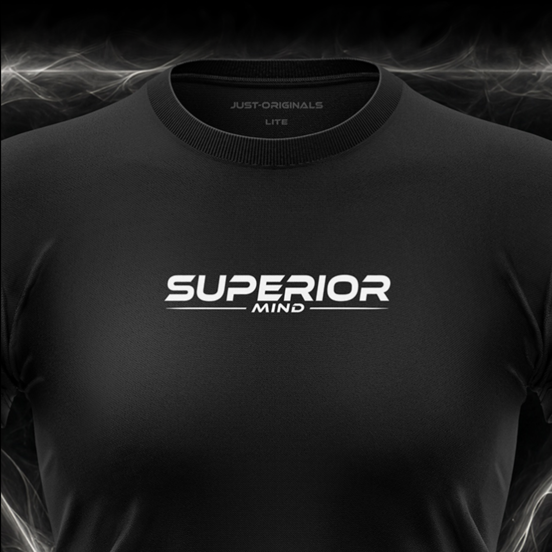Close-up of the JUST-ORIGINALS™ MAXPULSE™ LITE Women SUPERIOR MIND design on a BlackPulse™ performance t-shirt, featuring white and silver SUPERIOR typography, white MIND text, white accent line, silver premium neck label, and premium athletic fabric.