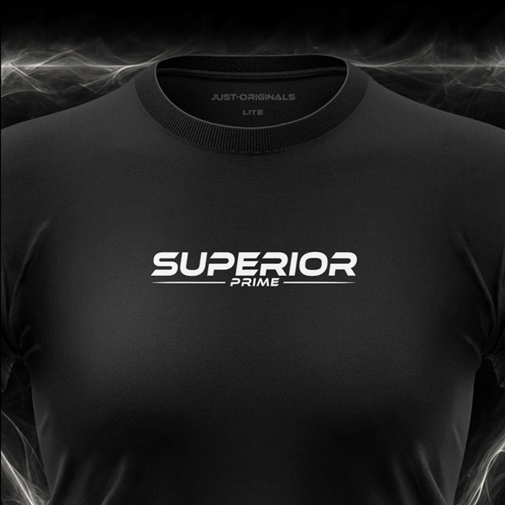 Close-up of the JUST-ORIGINALS™ MAXPULSE™ LITE Women SUPERIOR PRIME design on a BlackPulse™ performance t-shirt, featuring white and silver SUPERIOR typography, white PRIME text, white accent line, silver premium neck label, and premium athletic fabric.