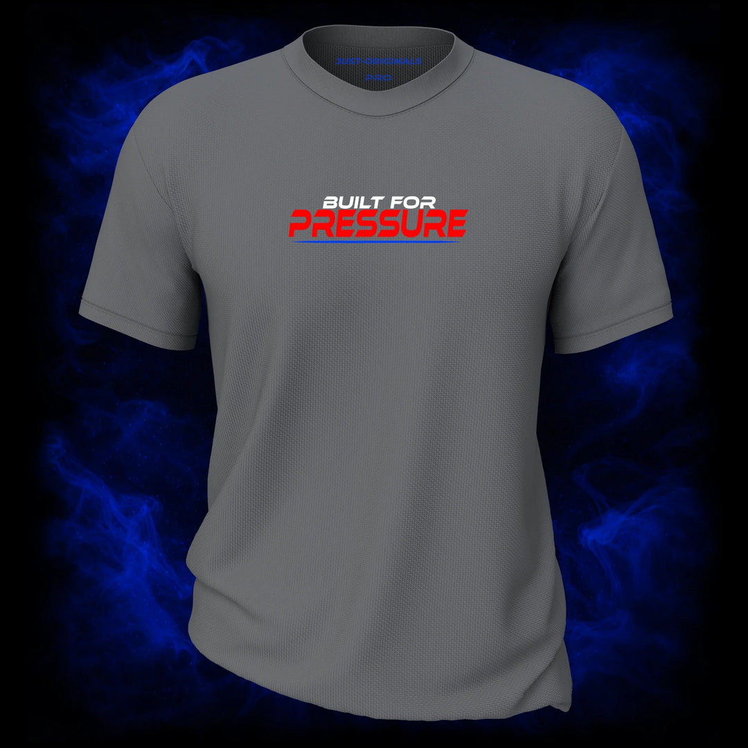 MAXPULSE™ PRO | BUILT FOR PRESSURE | Front Design | Bold red PRESSURE typography with white BUILT FOR accent and blue underline on SteelPulse™ performance tee | Featured in MAXPULSE™ PRO Men Performance Tee