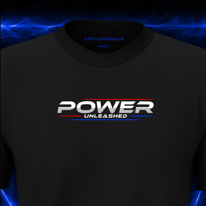 Close-up of the JUST-ORIGINALS™ MAXPULSE PRO Men POWER UNLEASHED design on a BlackPulse™ performance t-shirt, featuring white POWER typography, white UNLEASHED text, red and blue performance accent lines, and premium neck label.