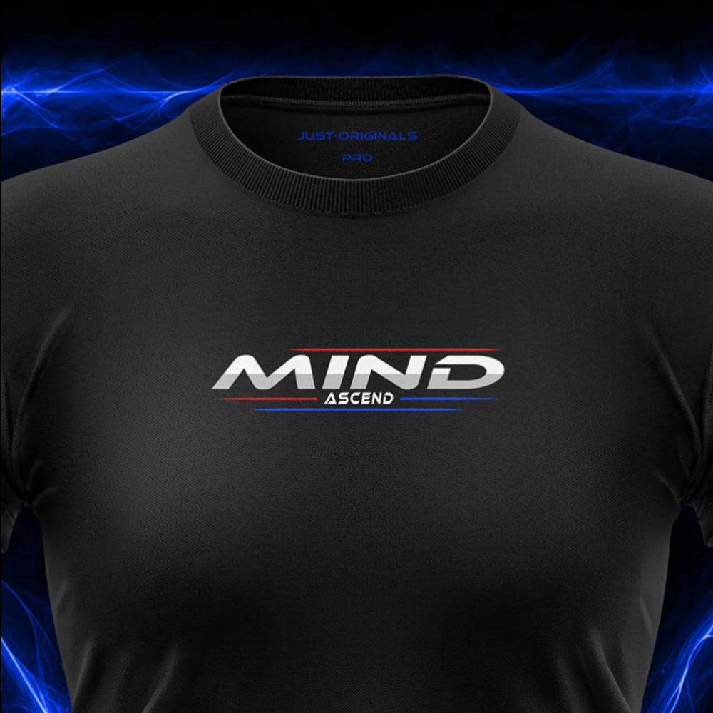 Close-up of the JUST-ORIGINALS™ MAXPULSE™ PRO Women MIND ASCEND design on a BlackPulse™ performance t-shirt, featuring white and silver MIND typography, white ASCEND text, red and blue accent lines, blue premium neck label, and premium athletic fabric.
